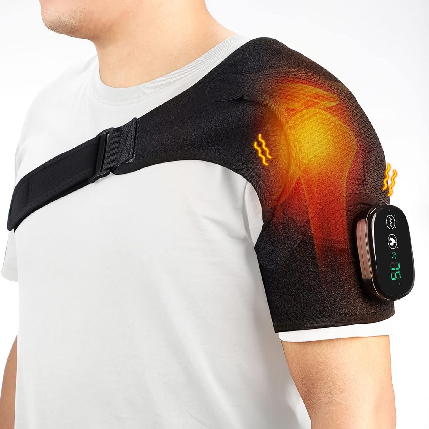 Person wearing a black electric shoulder heating massager with digital console display on a white background