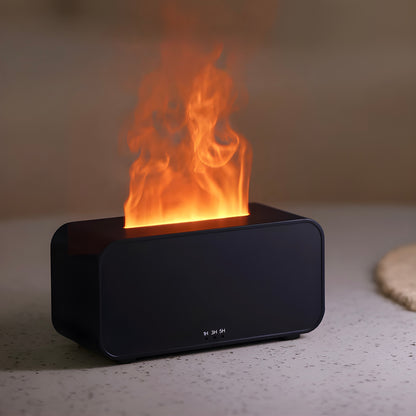Black rectangular LED-flame aromatherapy diffuser and humidifier on a light surface